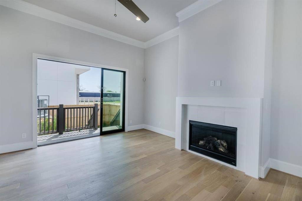 The large tri-fold sliding glass door provides indoor/outdoor living.