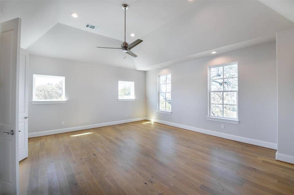 High ceilings and loads of natural light in the primary bedroom!