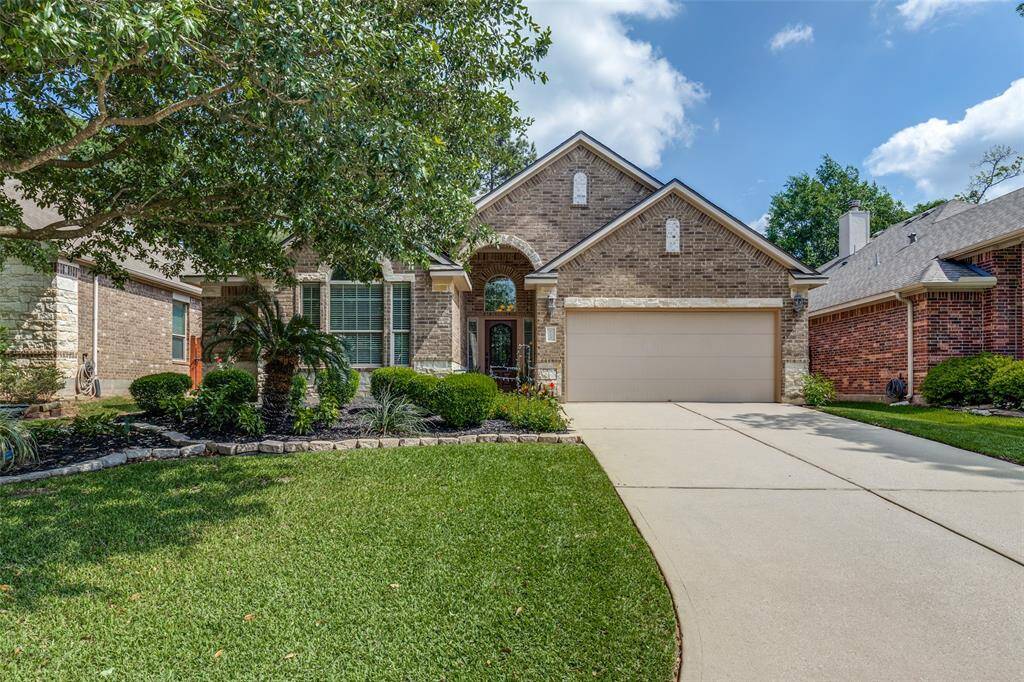 Welcome home to 115 Clearmont Place in Woodforest!