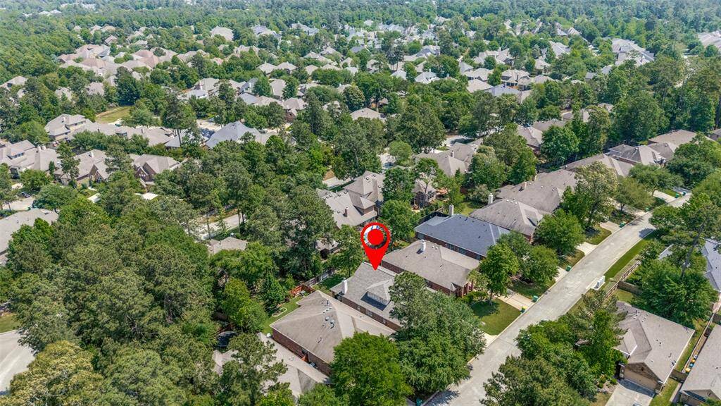 Aerial view of the wooded neighborhood of Woodforest.