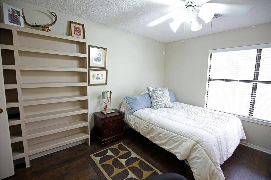 Secondary Bedroom with Built in Shelving!
