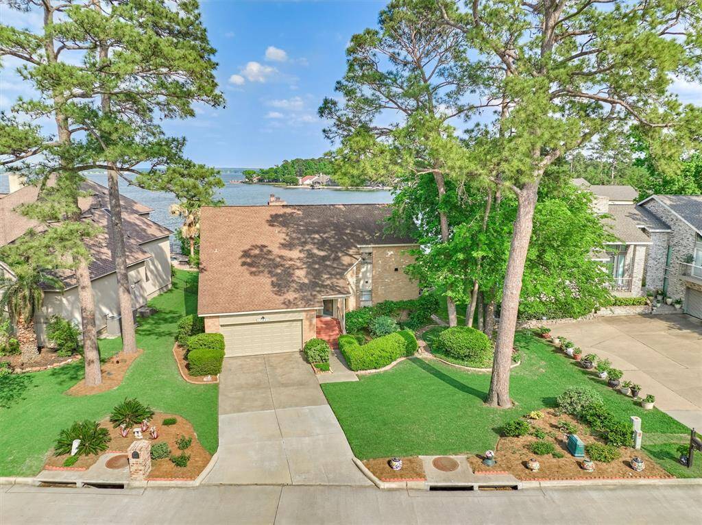 Welcome to 11381 Thoreau Drive in the highly sought after community of Walden on Lake Conroe.
