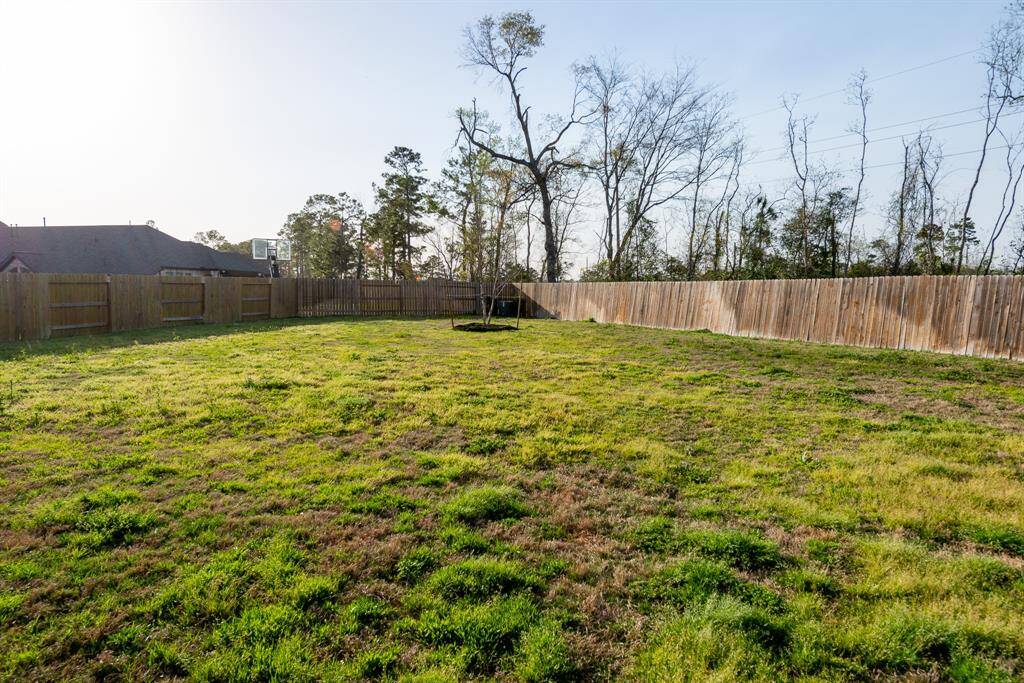 1/3 acre back yard. Large covered back patio