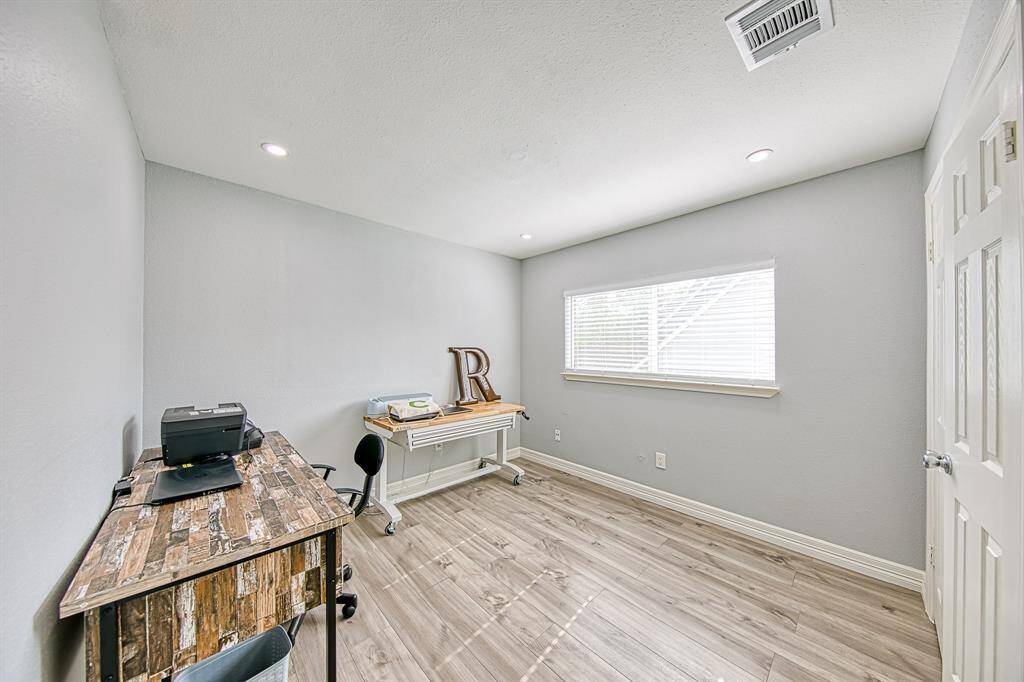 One of two secondary bedrooms