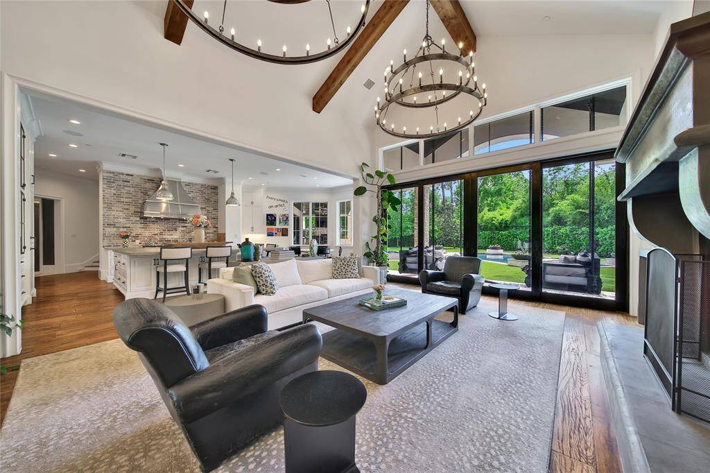 Open-concept family room with plenty of natural light and backyard views.