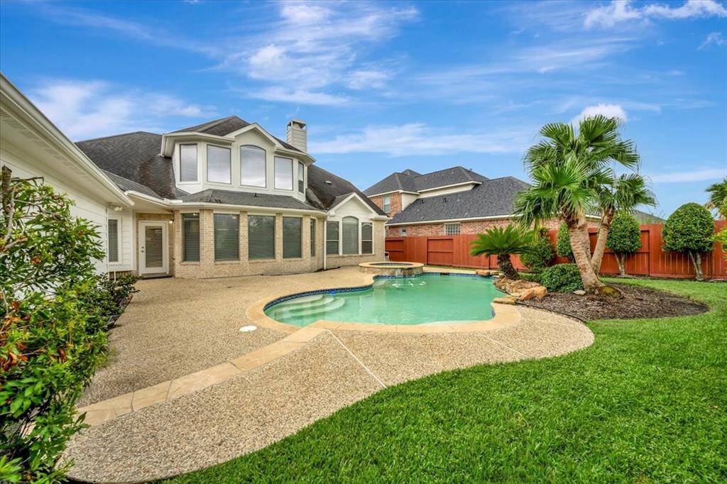 Pool and landscaped yard