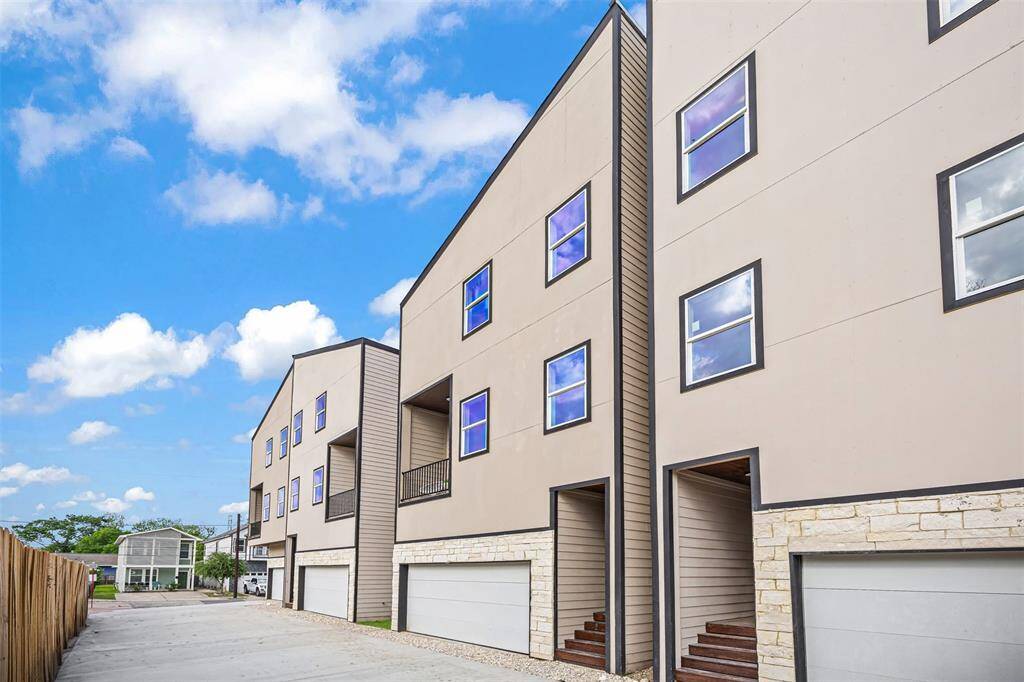 Contemporary curb appeal with a shared driveway and thoughtfully designed facades.