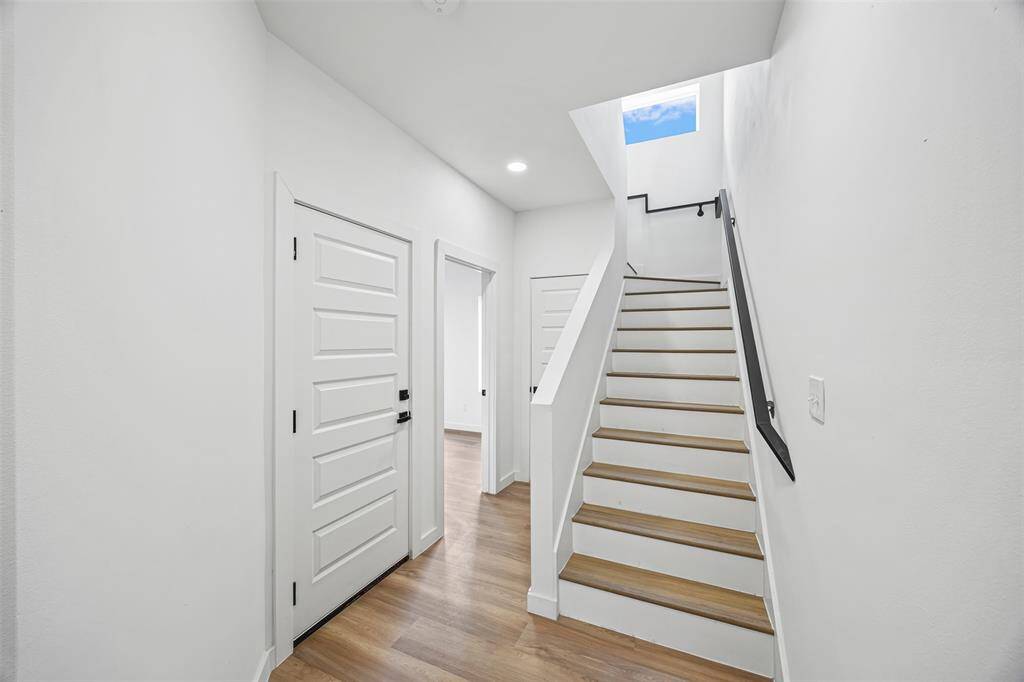 Bright and welcoming interior entryway with durable flooring and a functional layout that sets the tone for the rest of the home.