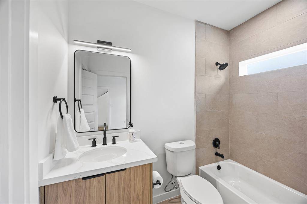 Convenient first-floor restroom with modern finishes, perfect for guests or everyday use.
