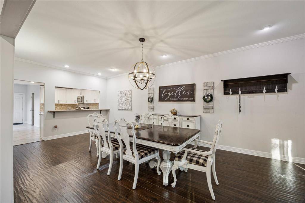 The dining room is spacious and open to the kitchen.