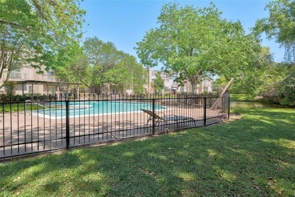 The community pool is located across the street from the home.
