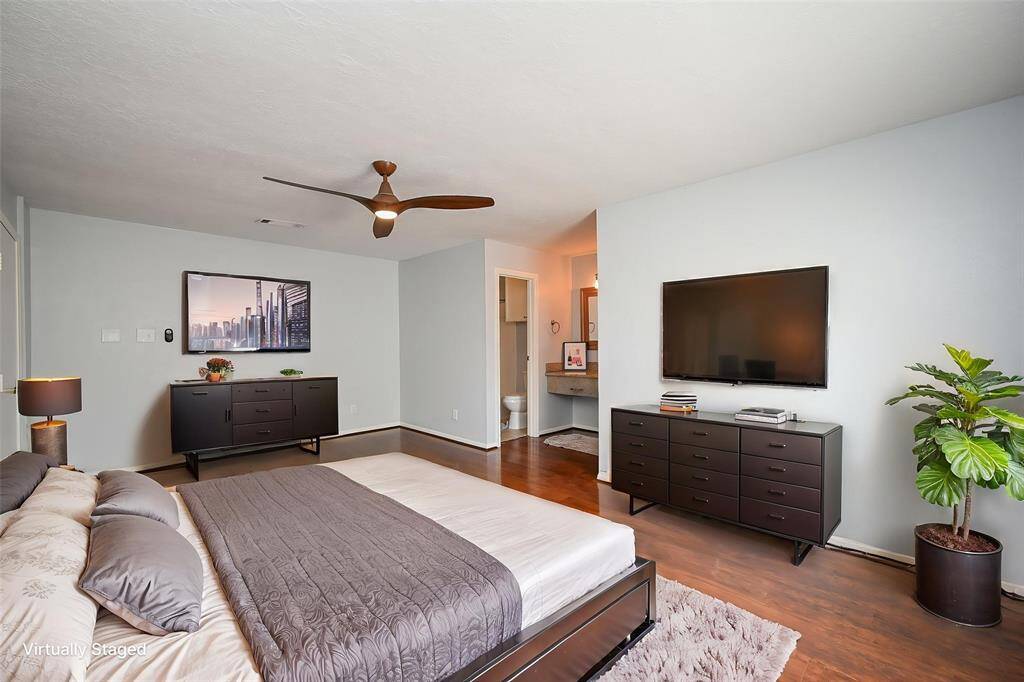 The primary bedroom is located upstairs its spacious and full of natural light.