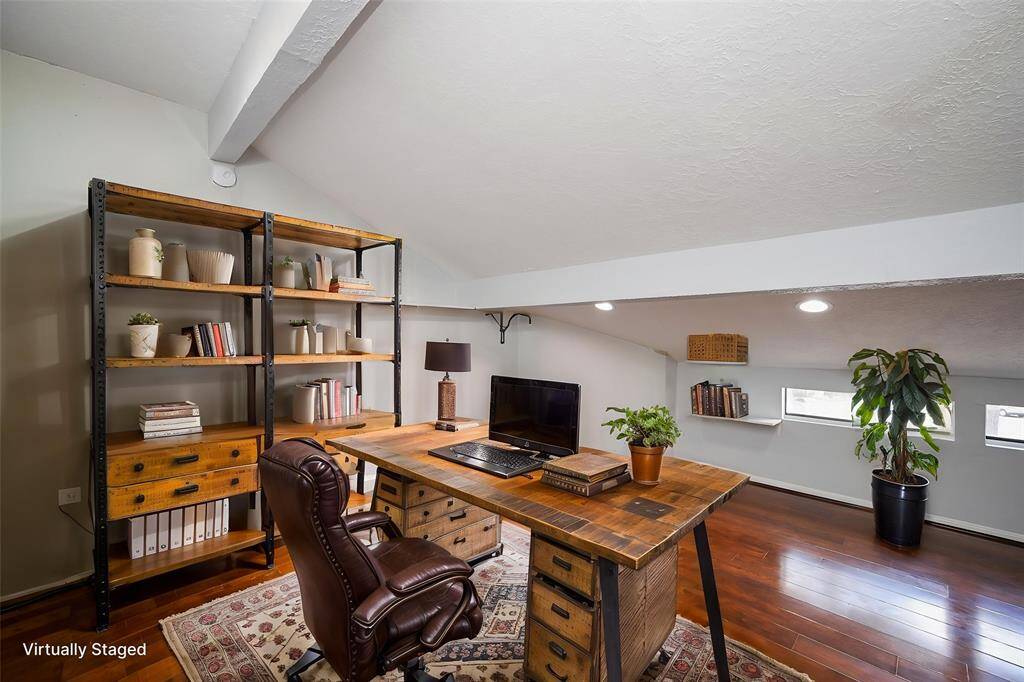 Versatile upstairs space for an office or cozy bedroom retreat.