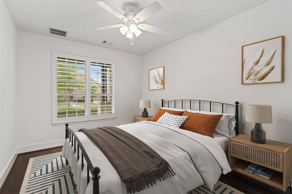 A secondary bedroom is located on the first floor, complete with access to an full bathroom—perfect for guests or multigenerational living.