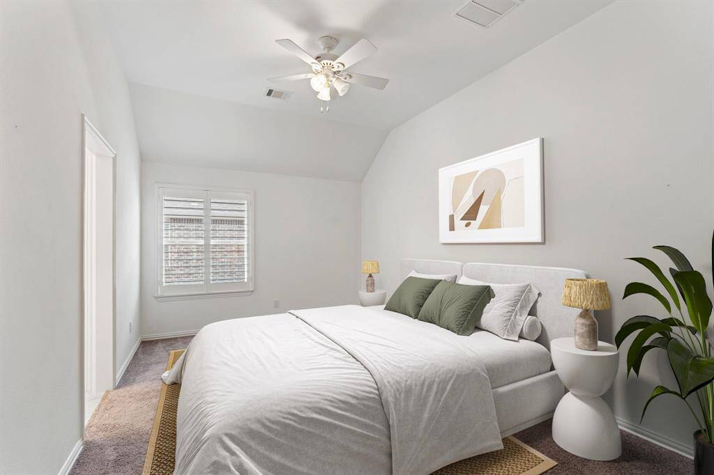 The home's fourth bedroom complete with a ensuite bathroom.