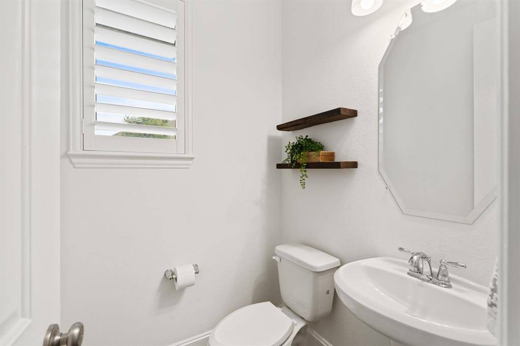 A convenient pool bath and closet located off the patio.
