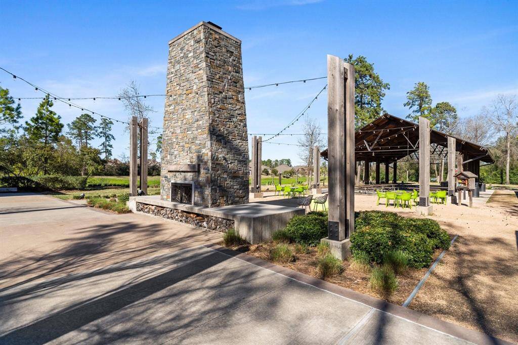 Residents will also enjoy a welcoming, oversized hearth fireplace complete with cozy bistro seating and soft festoon lighting.