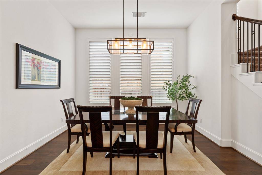 Pass this sizable formal dining room as you head to the living and kitchen areas.