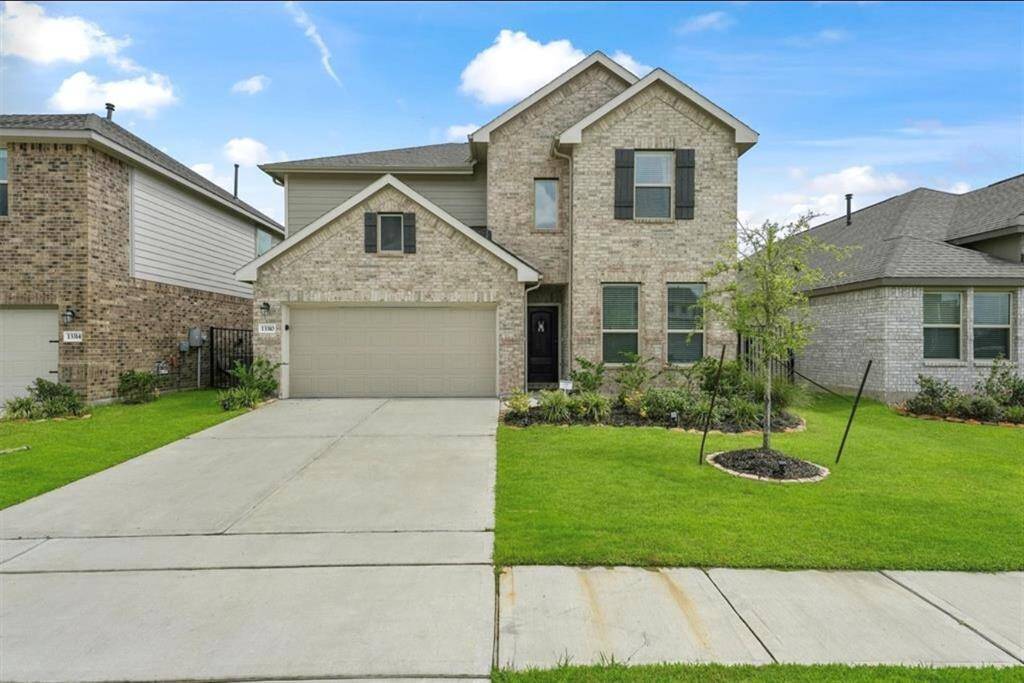 Welcome home! This beautifully built new-construction gem in Humble, TX boasts sleek curb appeal with fresh landscaping and a modern façade.