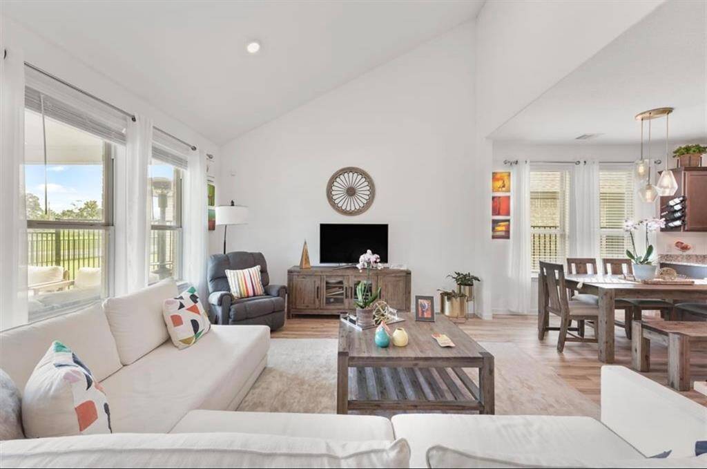 Perfect for entertaining or relaxing, the living room offers seamless flow and natural light galore.