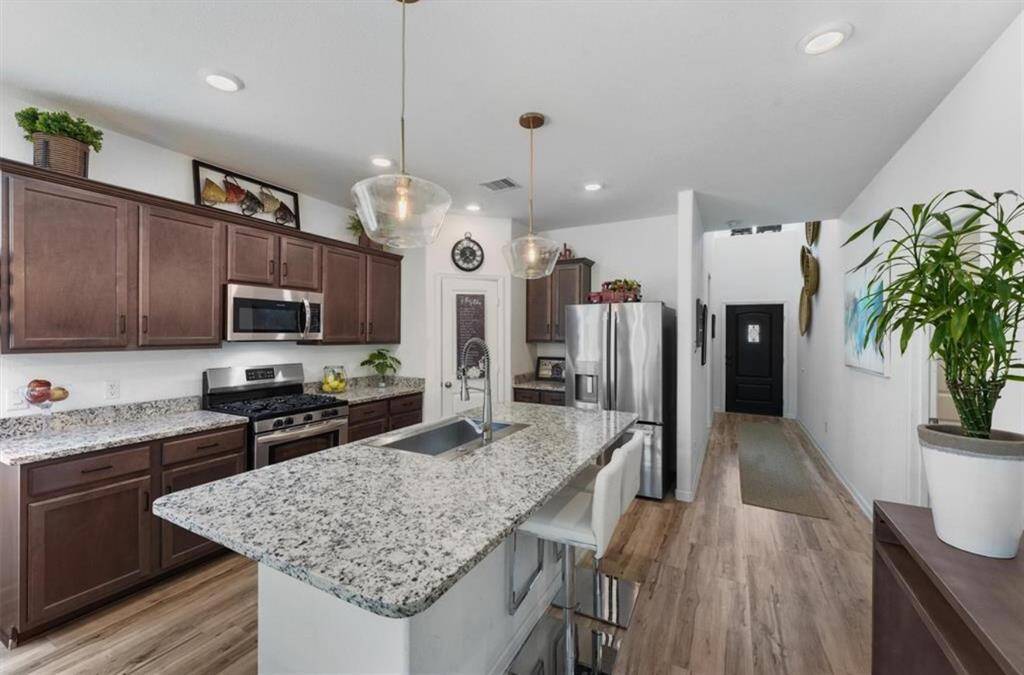 Modern finishes and a functional layout make this kitchen the heart of the home.
