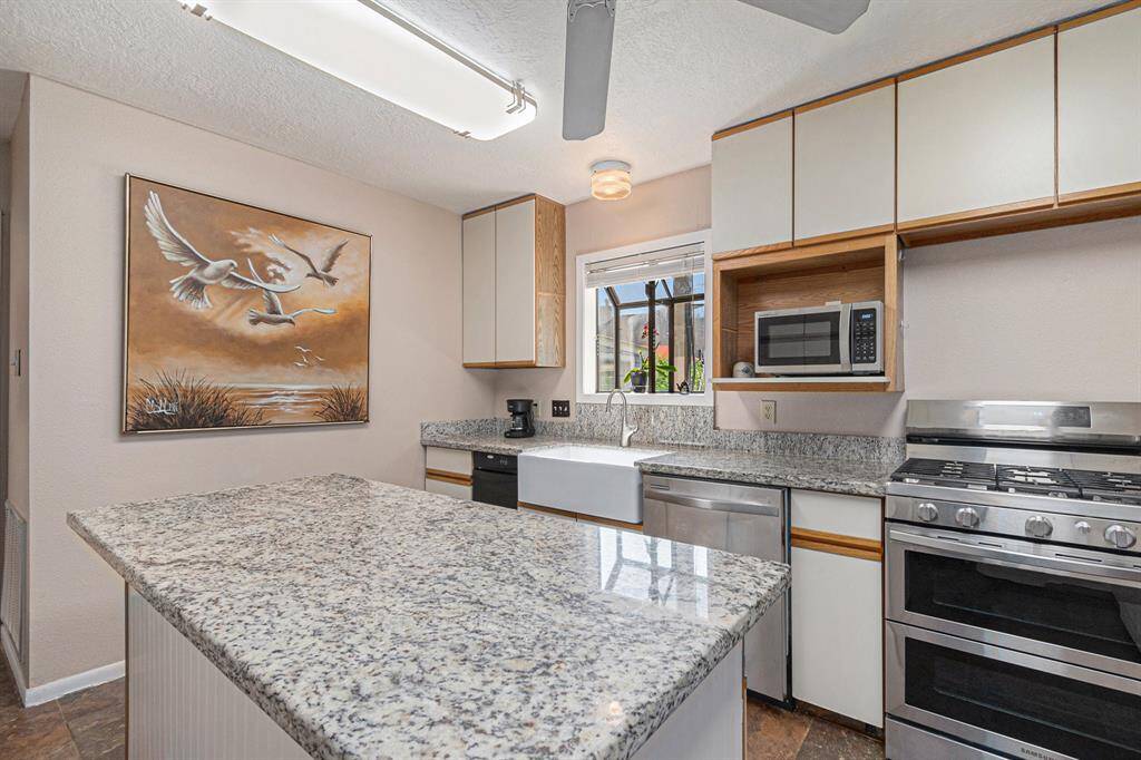 Kitchen island and updated gas range