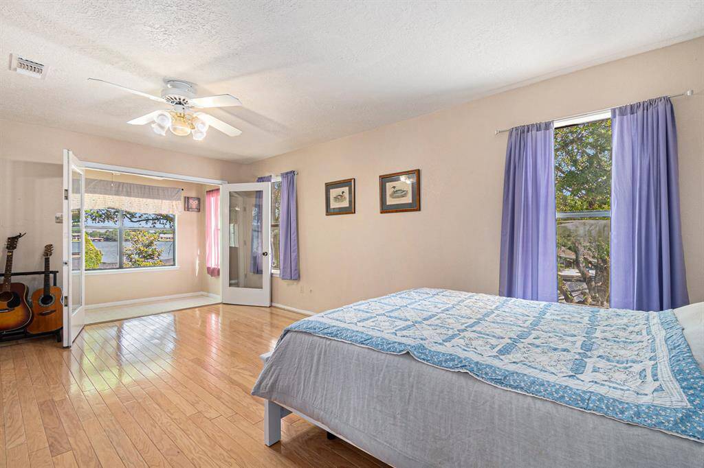 Bedroom 3 with french doors to the balcony