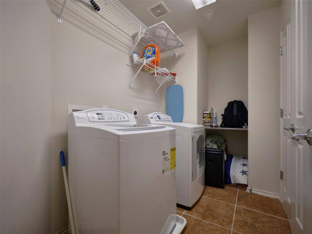 Laundry is located in the main hall and offer abundant storage.
