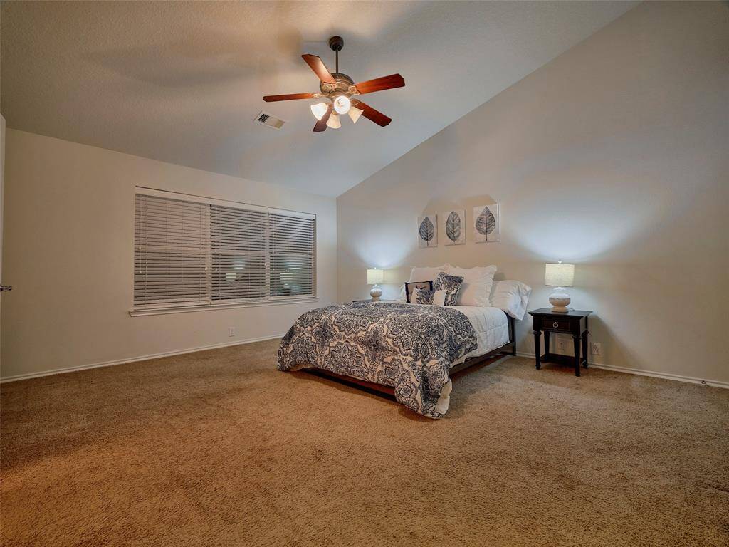 Wow! This primary bedroom is huge! With ensuite bath and walk in closet.