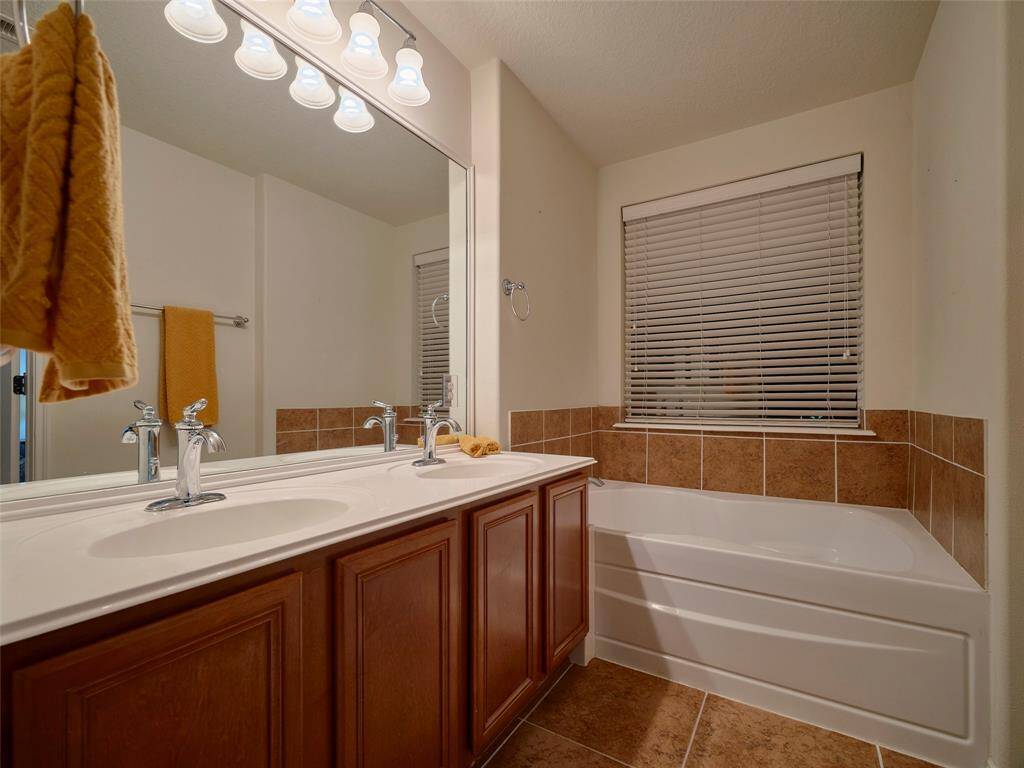 Primary Bath features a soaking tub and separate shower.