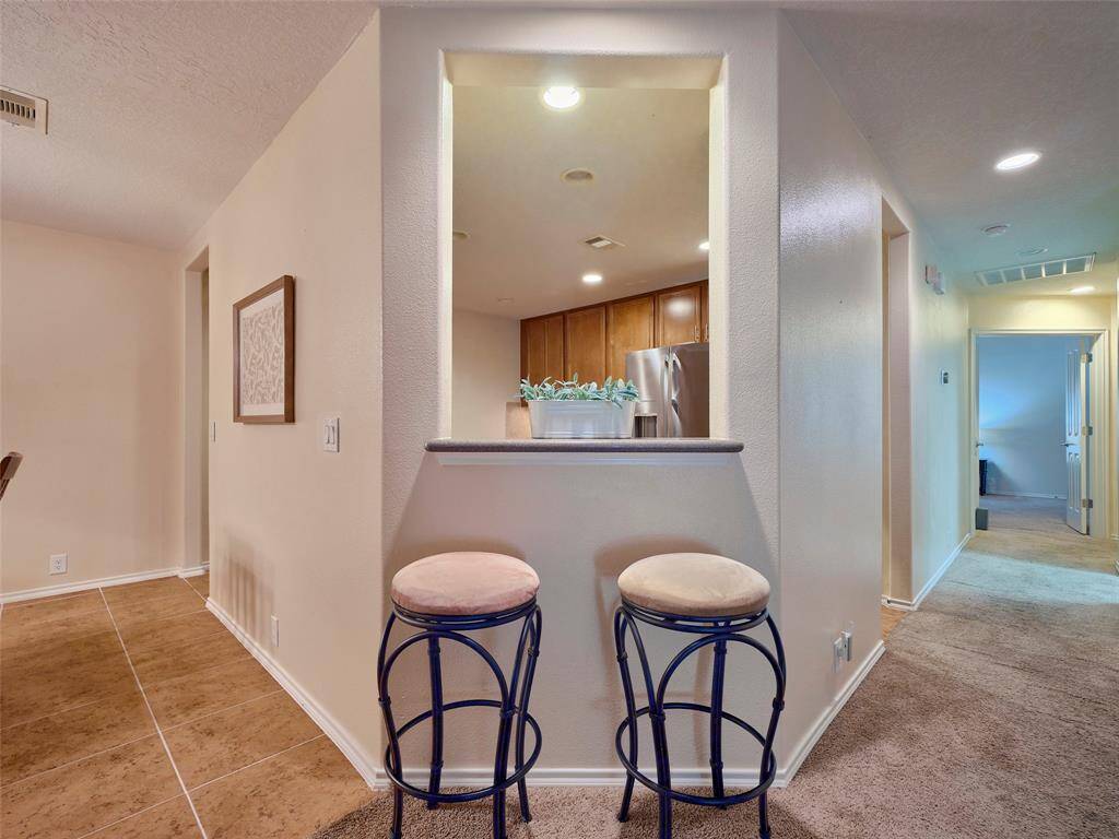 The kitchen is open to the living room.  Great for hosting parties and get togethers.