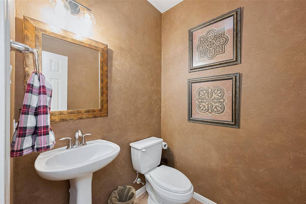 Half bath downstairs for ease of guest access/use.