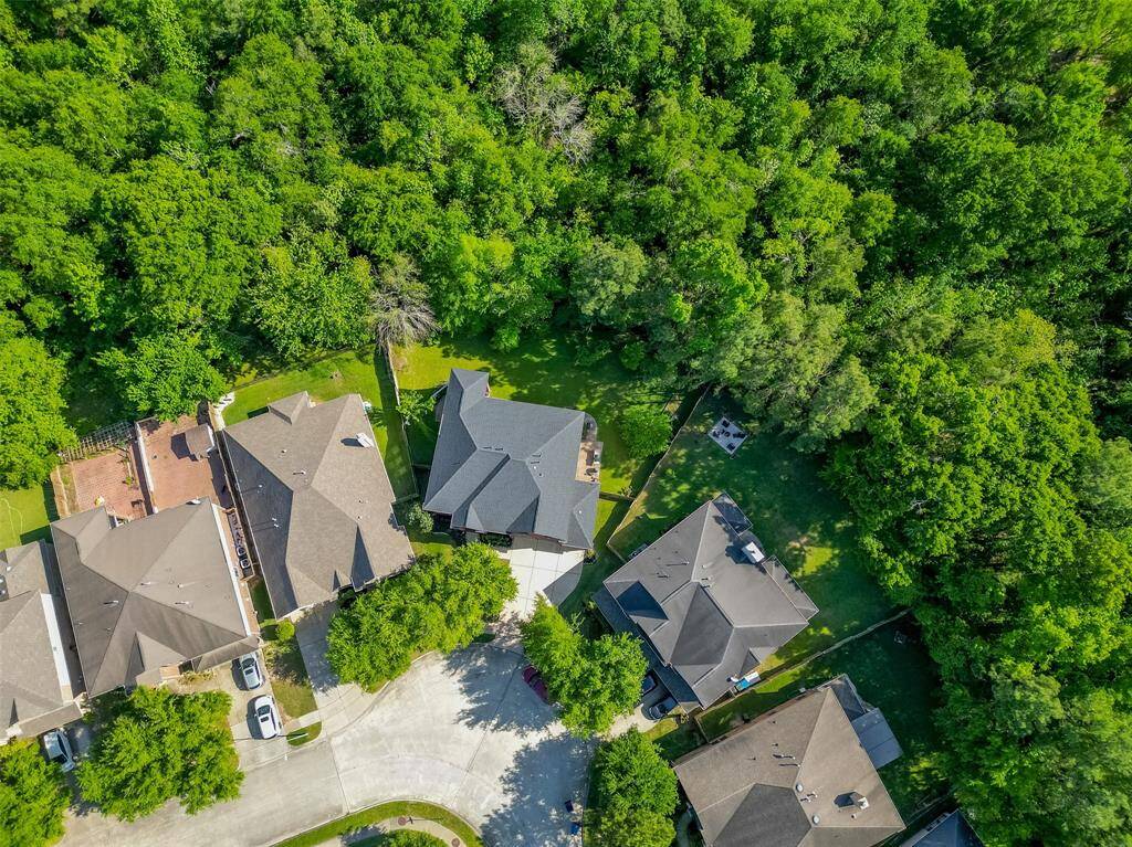 Property sits on a cul-de-sac with triple-wide drive way and 3-car garage.