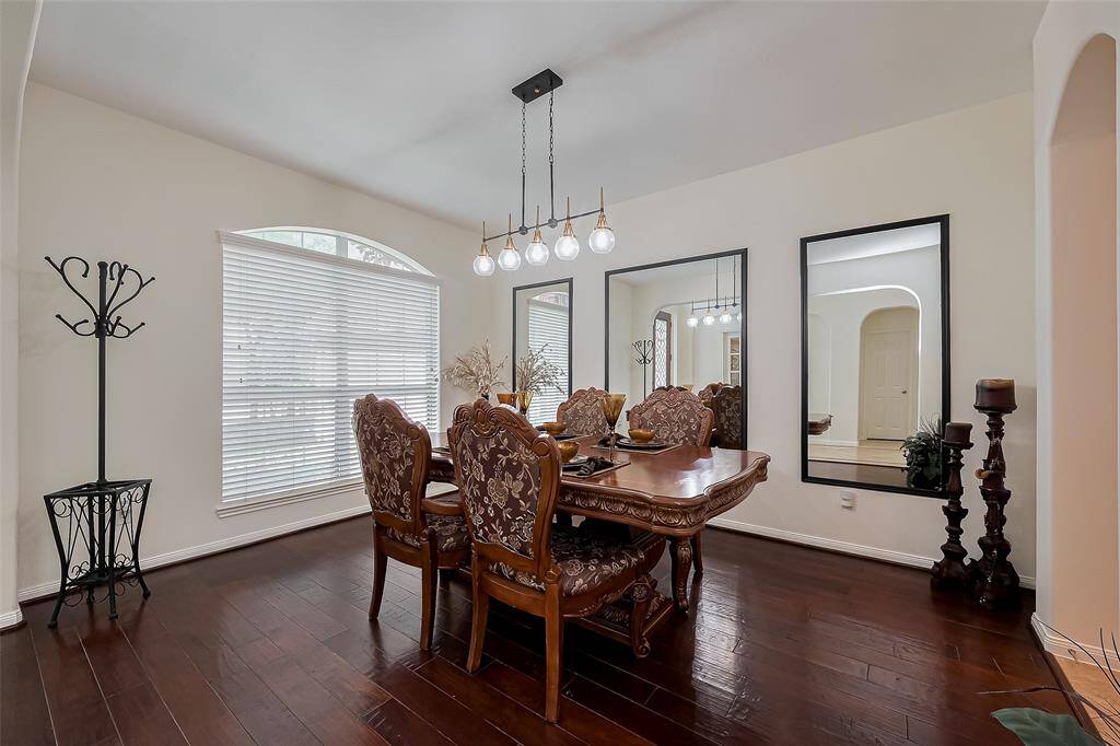 Foyer leads to spacious formal dining.