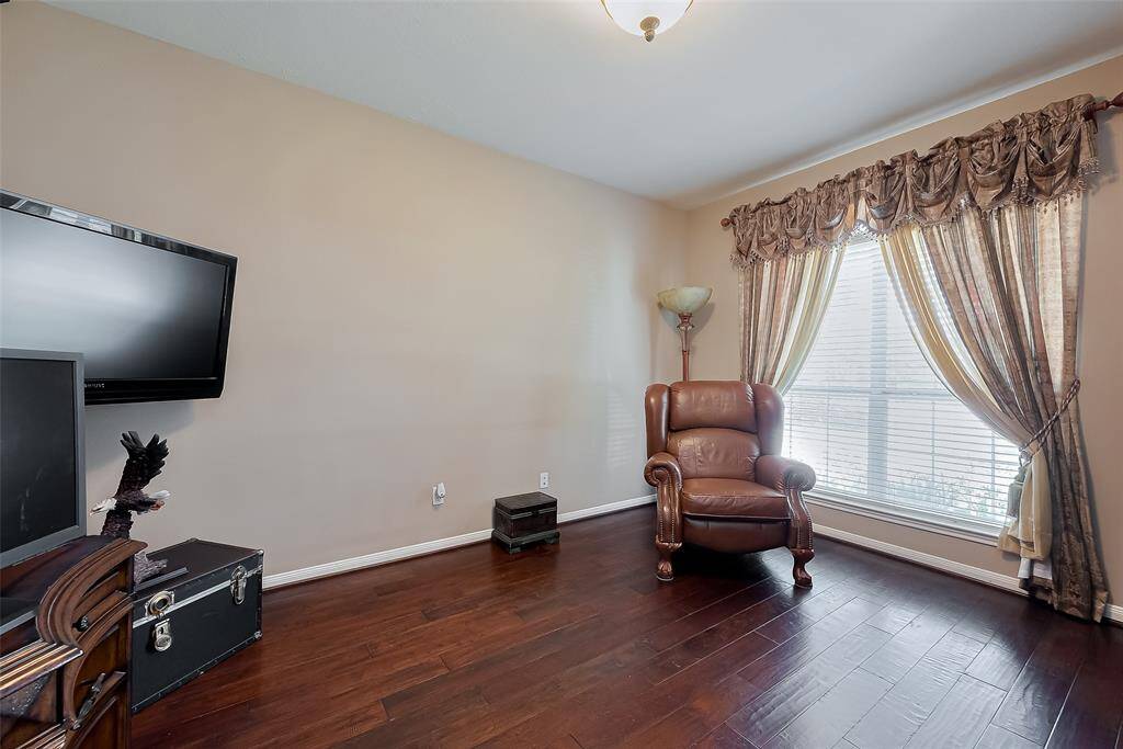 To the right of the entryway, you have a private study/office with French doors.