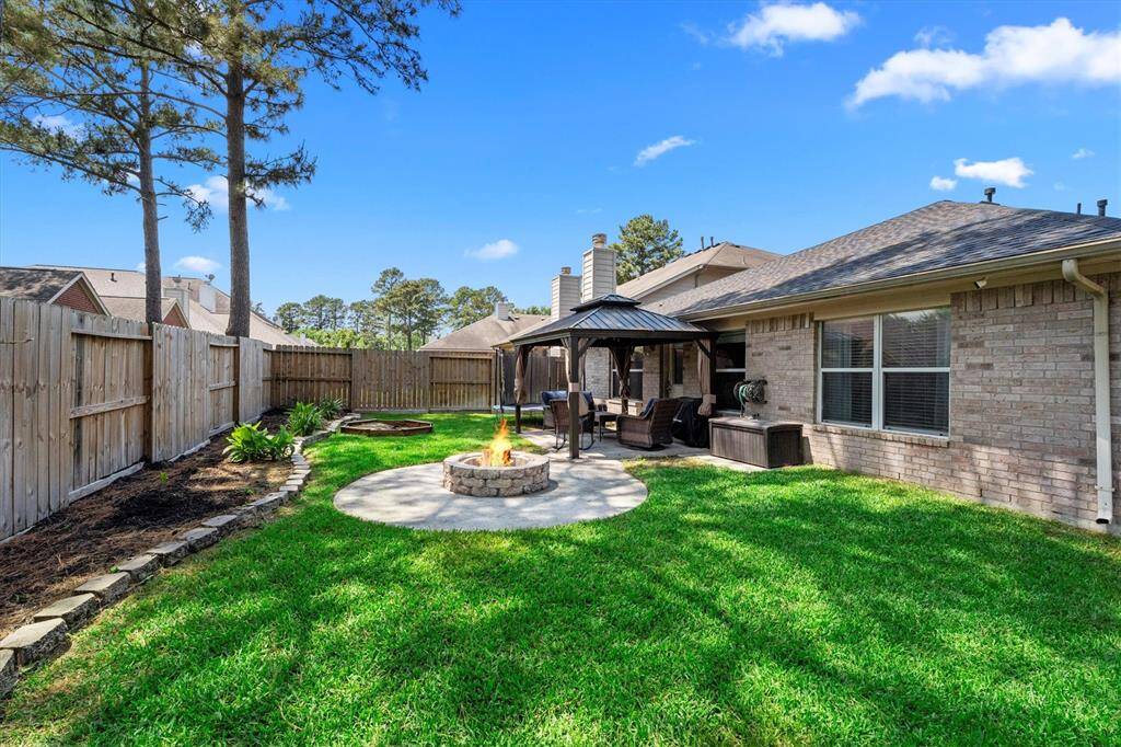 Backyard from back left.  Home faces north so sun sets on the side of the home versus coming directly in the front or back.