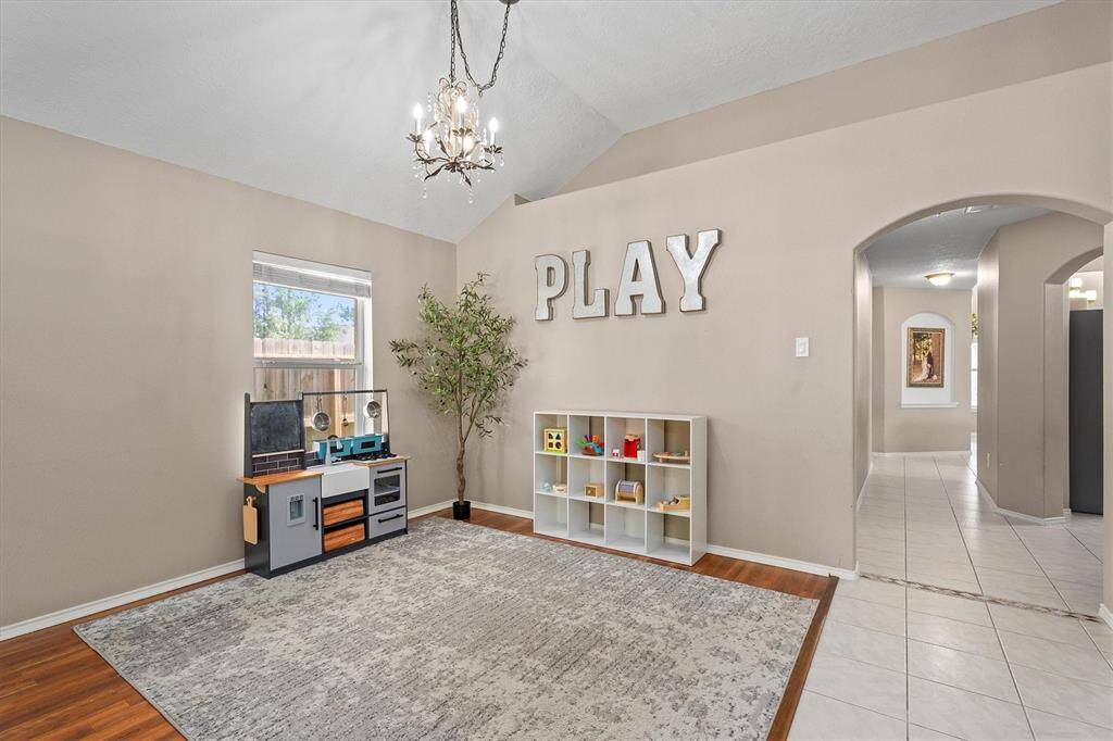 Formal Area with Dining Light Fixture.