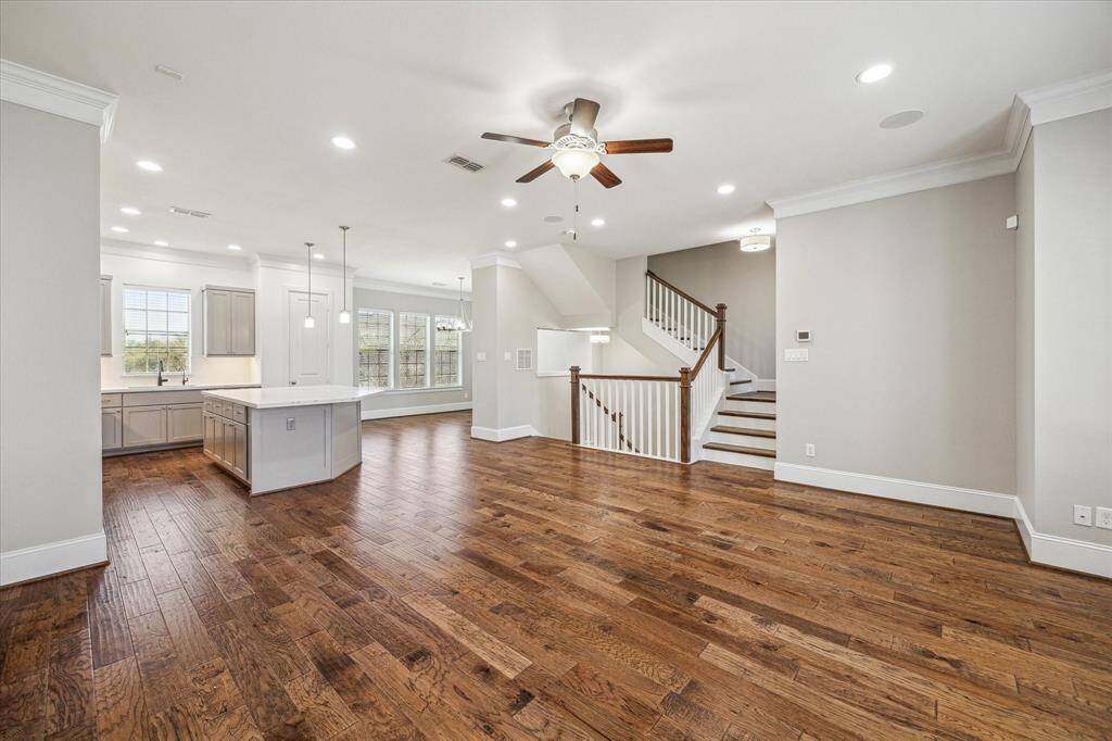 Imagine the sounds of laughter and chatter as you create memories of a lifetime in this beautiful home. This inviting open floor plan provides the perfect space to do just that.