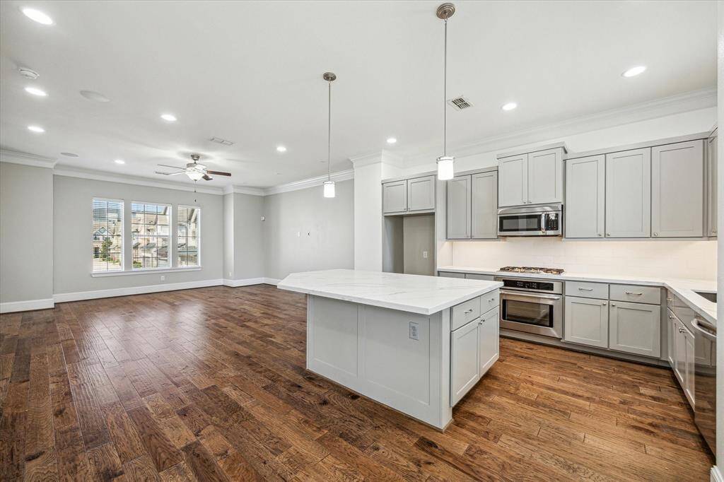 This fully loaded kitchen has ample cabinetry and countertop space making meal prep and cleanup a snap.