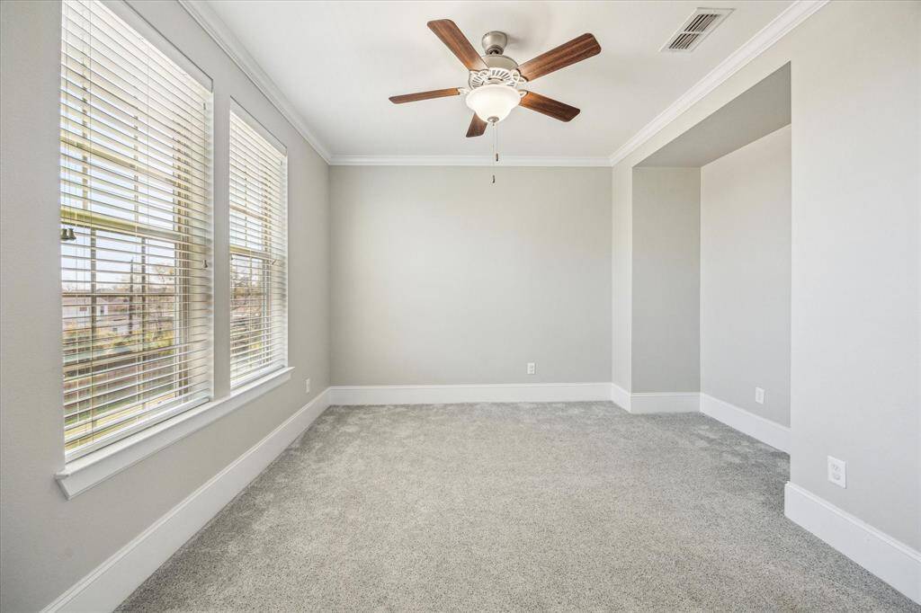 Your family and guests will rest comfortably in this spacious bedroom with ample space for large furniture, games, toys, and more.