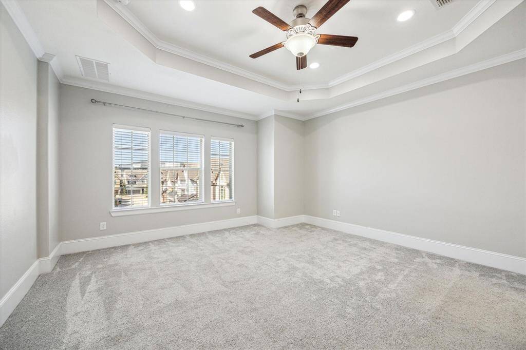 You'll have sweet dreams in this posh owner's retreat with soft neutral finishes, a large walk-in closet, and a luxurious ensuite bathroom.