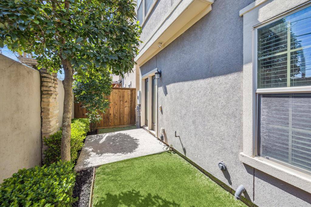 Get some fresh air and sunshine in your private fenced yard with a patio and just enough grass/upgraded turf for family pets.