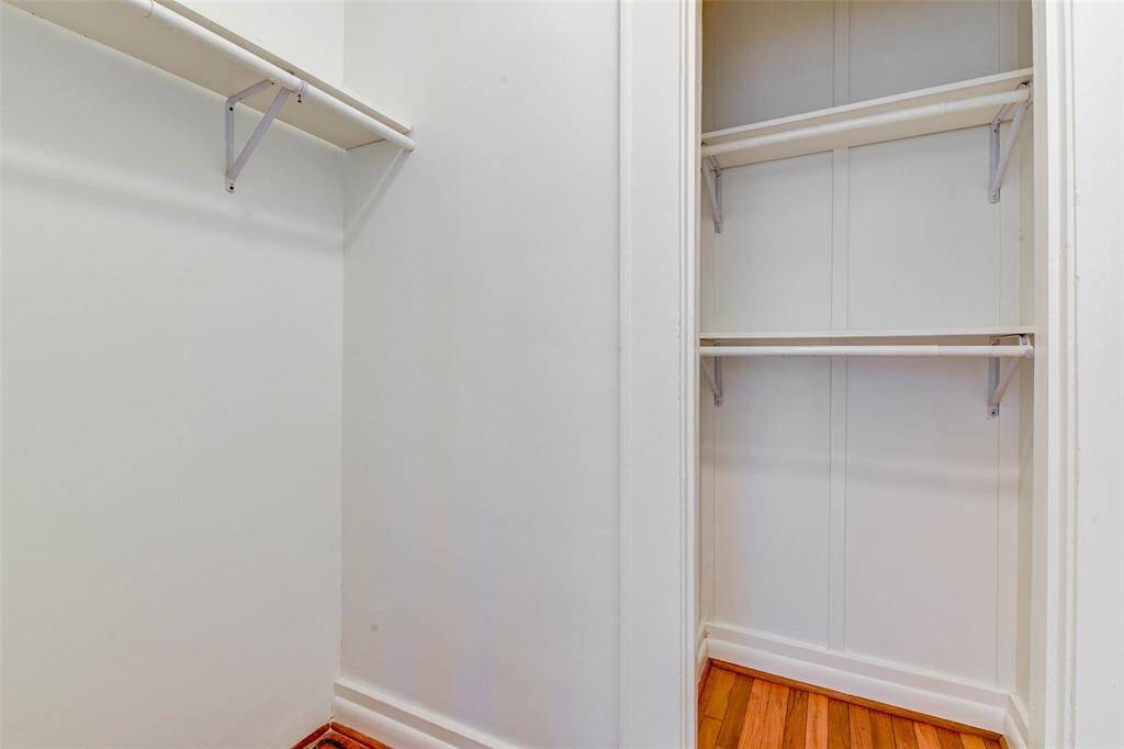 Hall closet with two sections. This closet is extra deep as it goes under stairs of mainhouse. Room for hanging clothes, linens and suitcases as well as storage bins