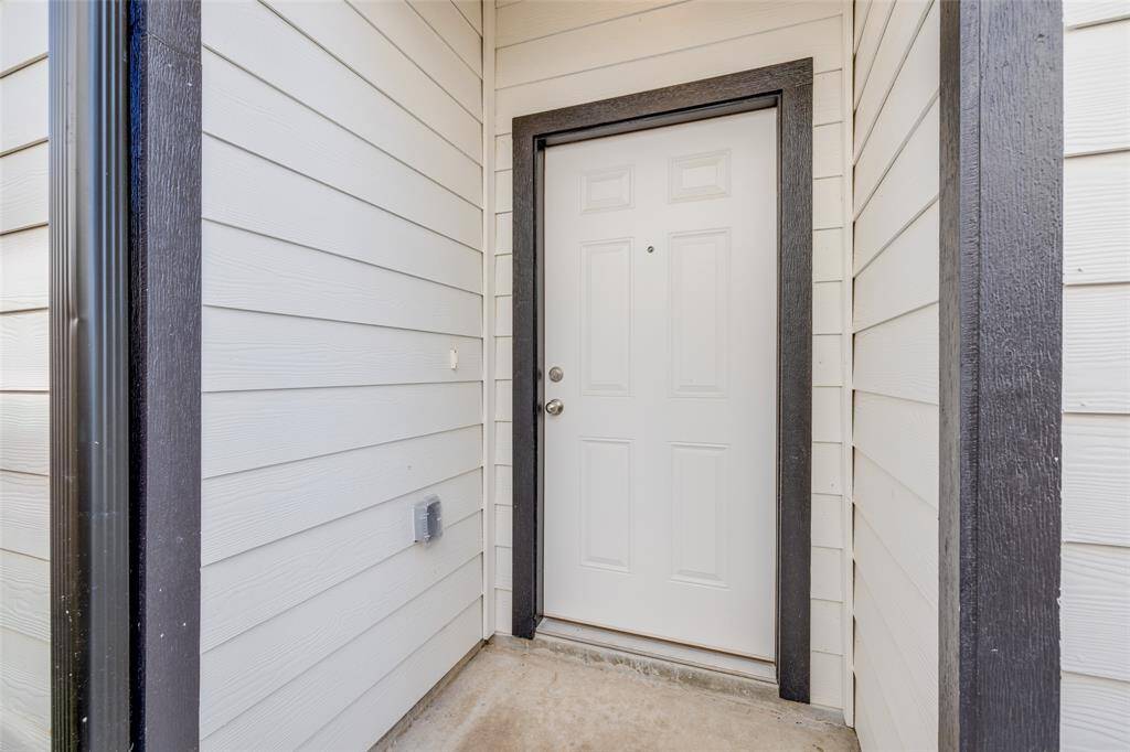 Charming front porch with covered entry for a warm welcome.