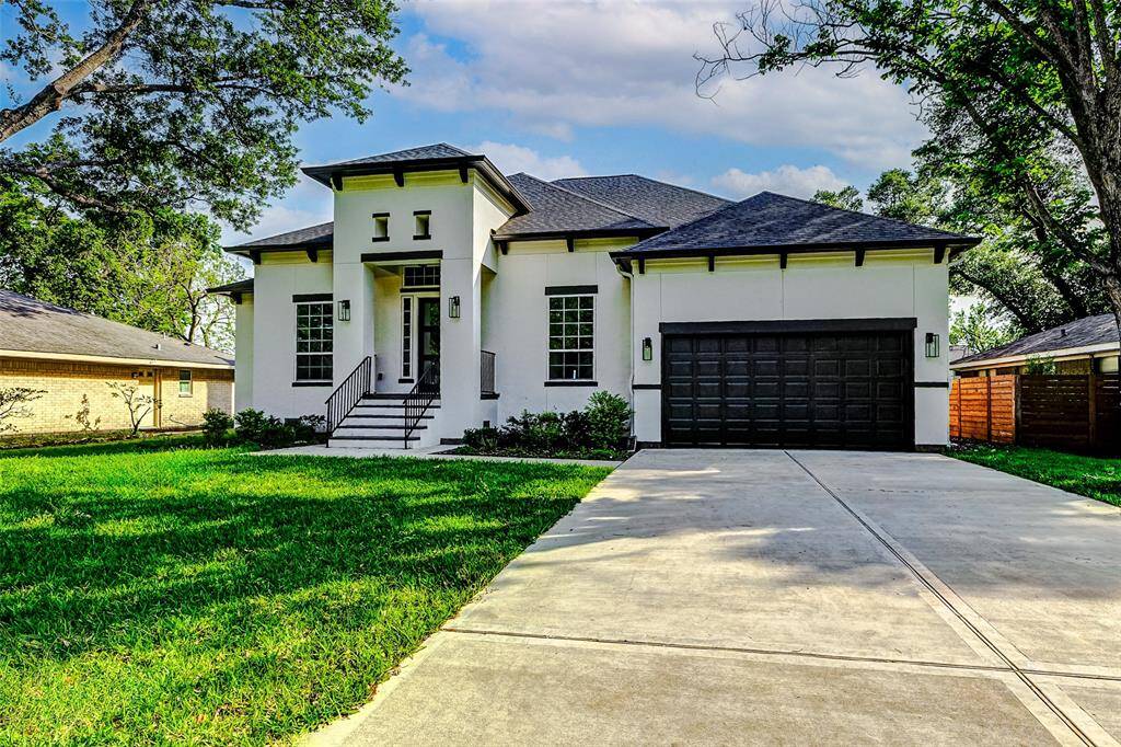 Welcome to 15505 Shanghai Street, an elegant single-story residence nestled in the heart of Jersey Village. This thoughtfully designed home offers 4 spacious bedrooms, 3 full bathrooms, and an attached 3-car tandem garage. With striking curb appeal, the modern stucco exterior is complemented by energy-efficient double pane windows and lush, professionally designed landscaping.
