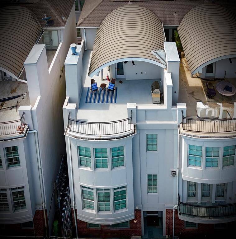 Welcome home! This luxurious townhome has a spacious roof top deck. The perfect place to relax at the end of a long day, or to do some grilling!
