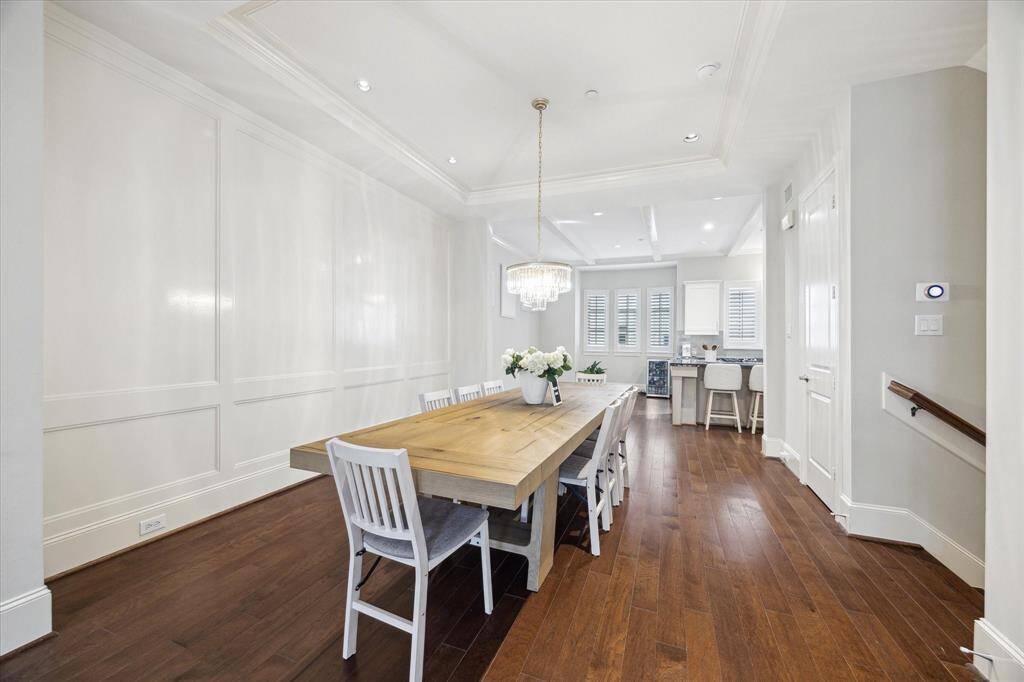 From the open living room, you can see THROUGH the dining area all the way back to the kitchen.   If you have dreamed about an open floor plan, you must come see this home.
