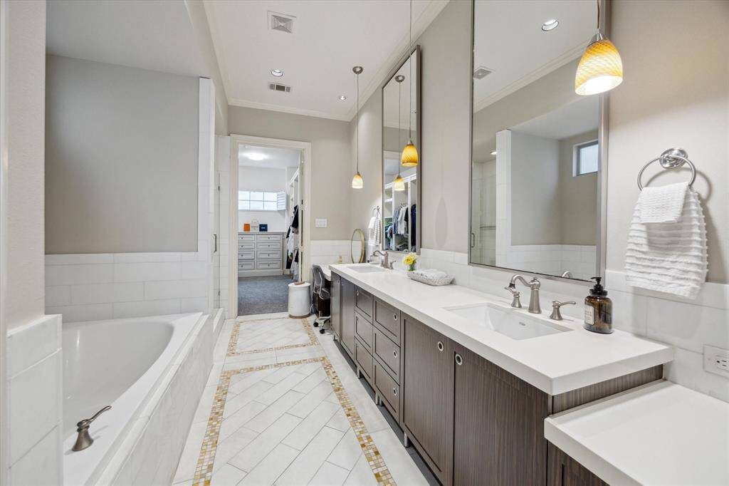 Beyond this amazing bathroom is the walk in closet.