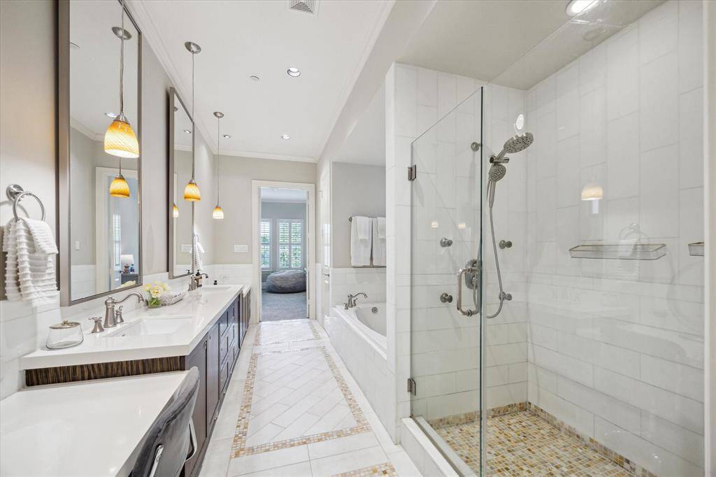 There is such a spa feel about this primary bathroom.