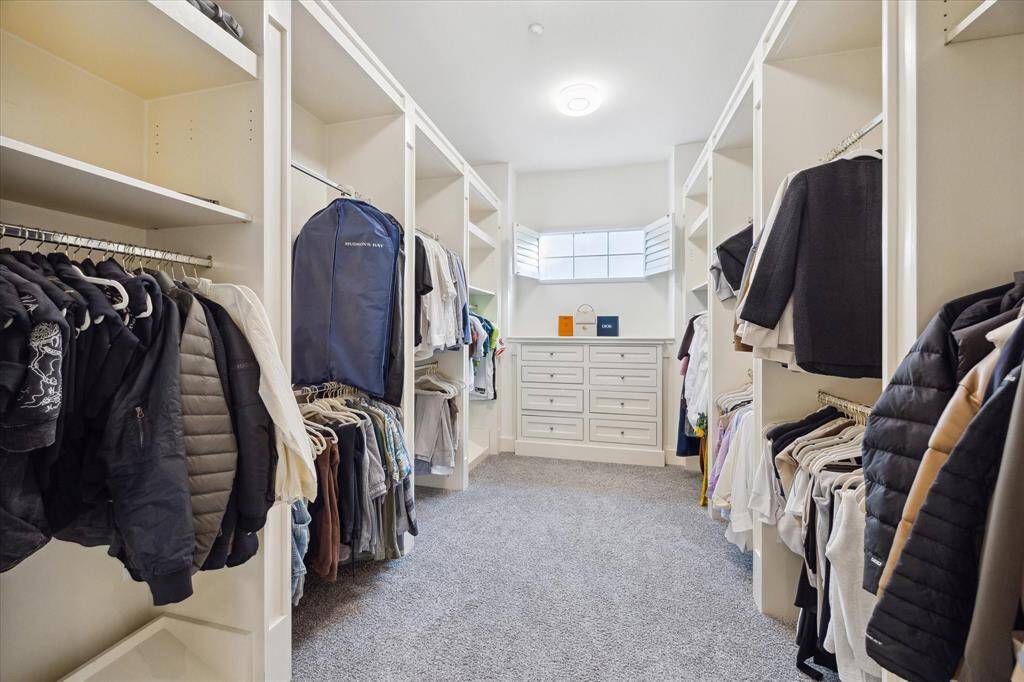 lThis walk-in closet is dreamy, and so many clever storage possibilities.